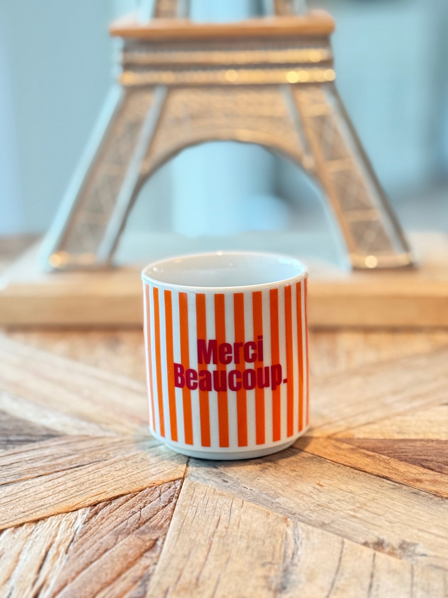 MERCI BEAUCOUP. Orange/Rouge